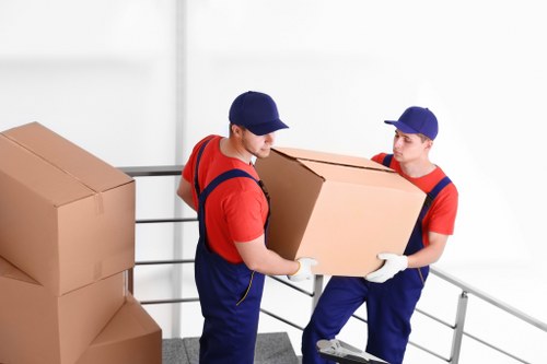 Packed storage unit with labeled boxes and furniture