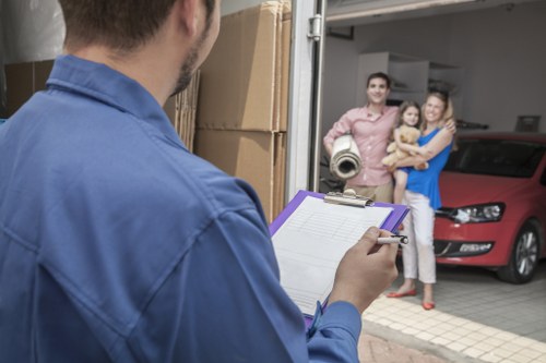 Maryland moving crew handling household boxes and furniture