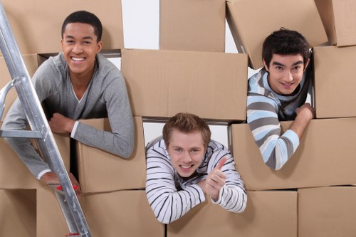 A local Maryland small moving team packing office furniture for transport