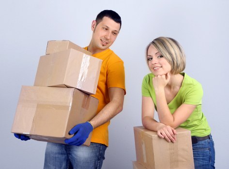 Professional movers loading furniture during a Maryland home relocation