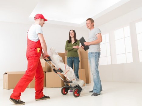 Professional movers loading furniture for a Maryland relocation