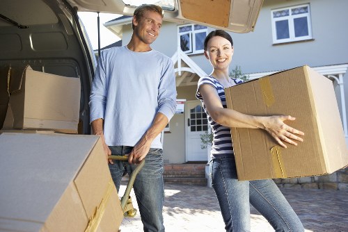 Carefully wrapped fragile items for apartment relocation