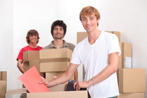 Packed office supplies and workstation items ready for transport